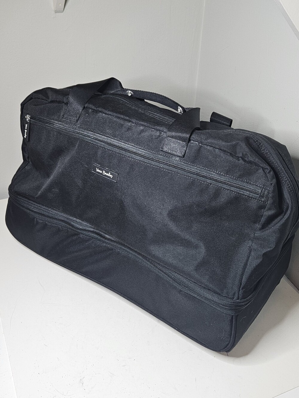Vera Bradley black travel duffel bag bottom compartment Wheels Handle